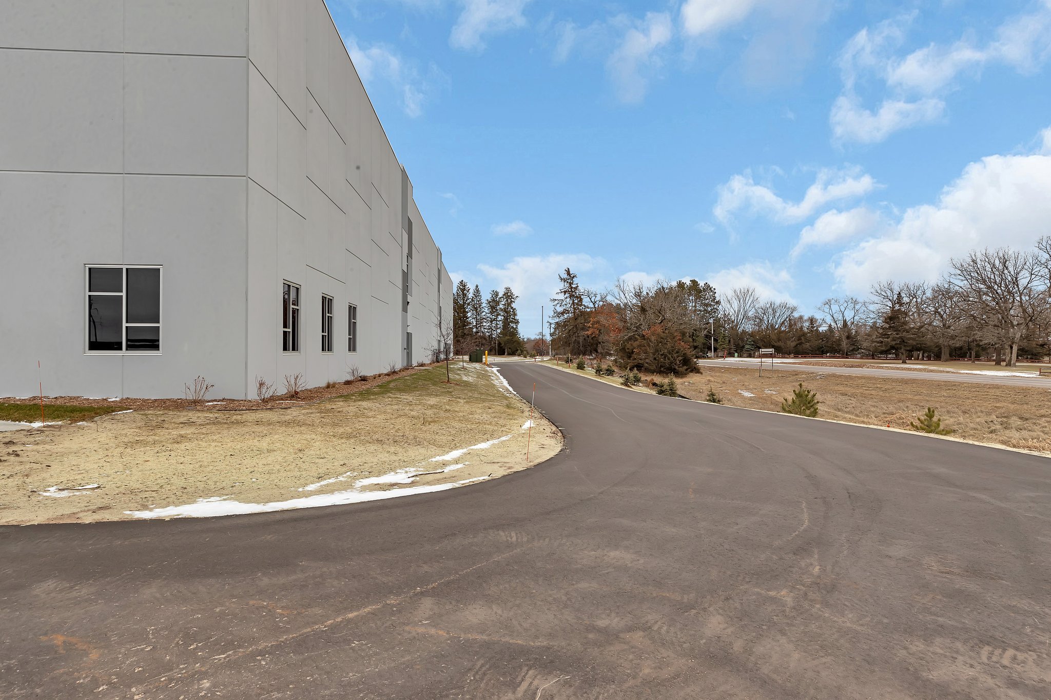 Approach to building with landscaping